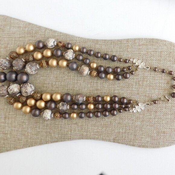 Vintage 3 strand bead necklace. Shades of brown and gold. Has moon glow beads - Picture 3 of 4